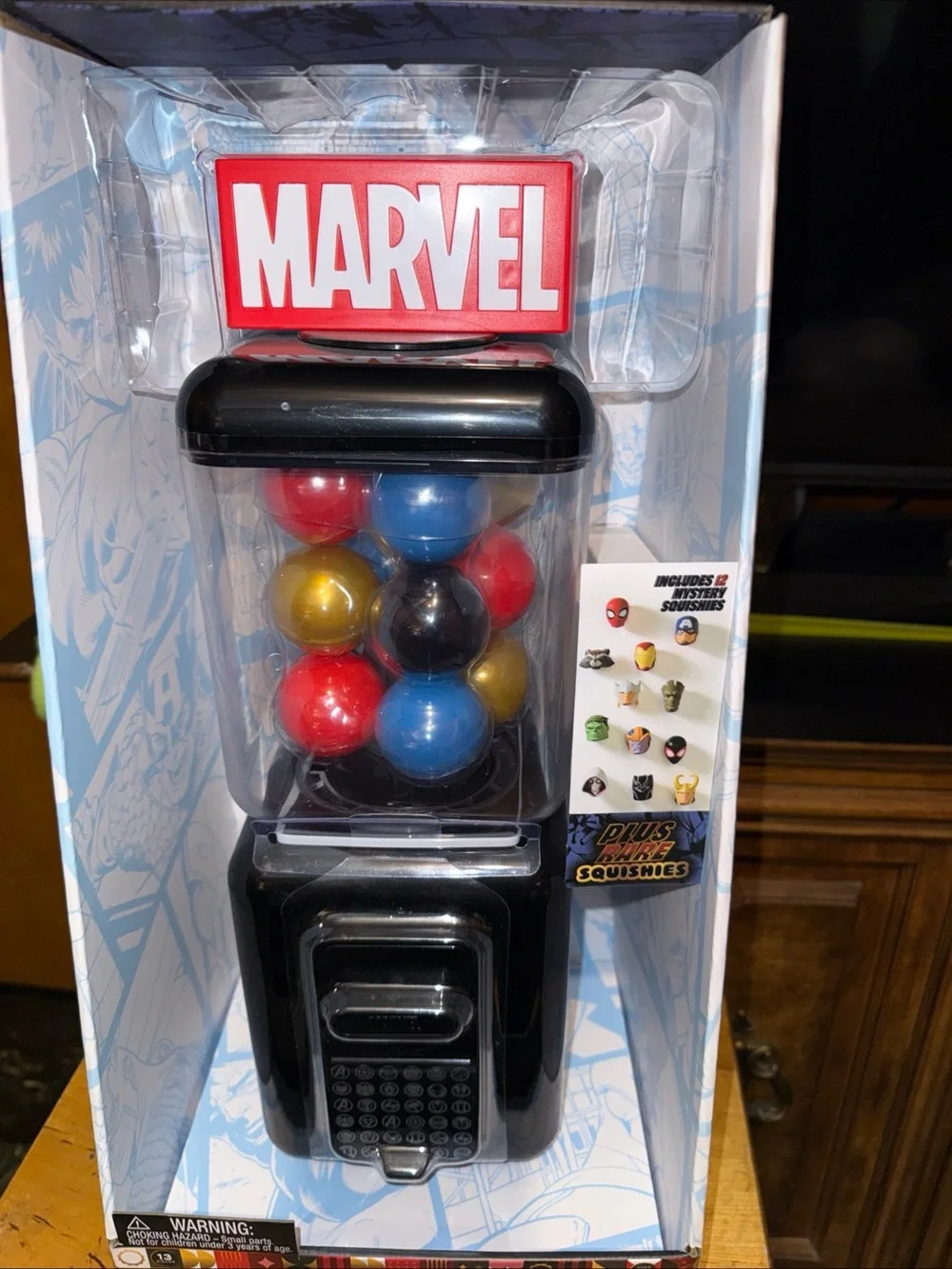 Marvel Black Capsule Machine with Red, Blue, Gold, Black Capsules